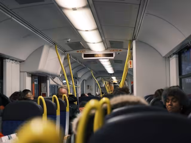 Commuters Traveling Inside a Public Train